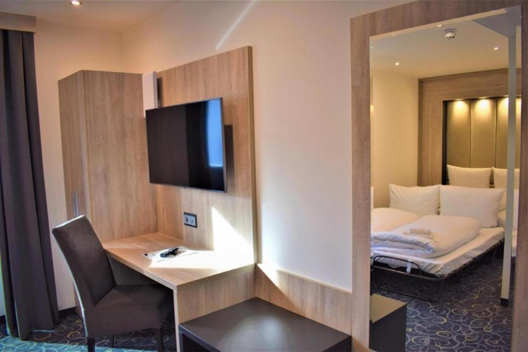 Hotel Business Bay Das Ehemalige Staycation Hotel Зиндельфинген Экстерьер фото