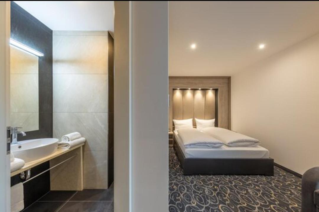 Hotel Business Bay Das Ehemalige Staycation Hotel Зиндельфинген Экстерьер фото