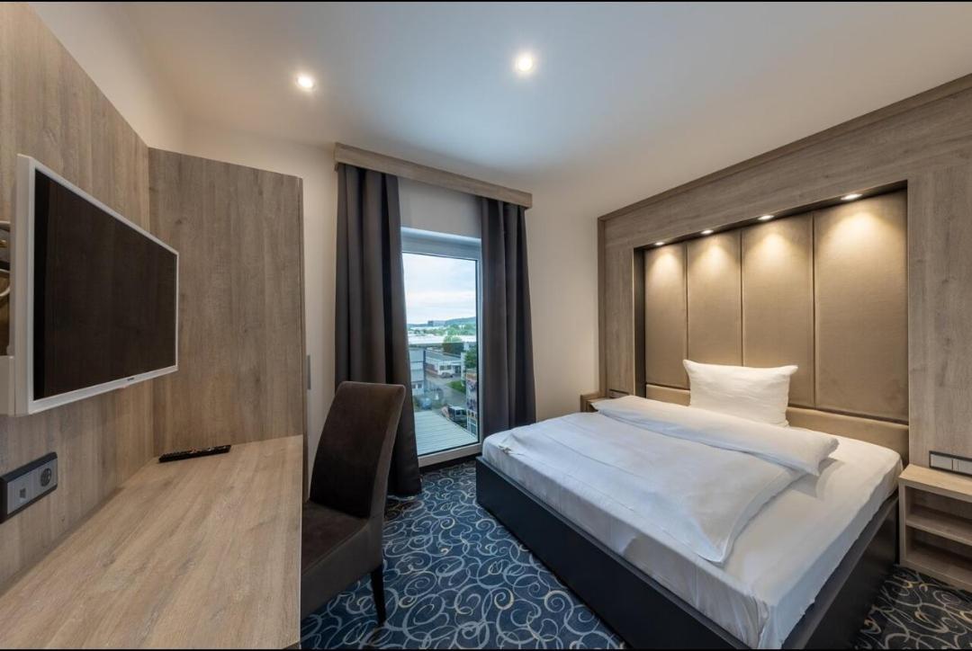 Hotel Business Bay Das Ehemalige Staycation Hotel Зиндельфинген Экстерьер фото